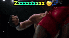 a man is laying on the ground in a boxing ring with zzzzzzzzz written above him