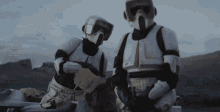 star wars the mandalorian baby yoda stormtroopers bite