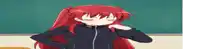 a girl with red hair is sitting in front of a green board