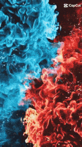 a blue and red smoke coming out of a black background