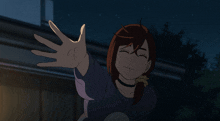 a girl with a choker on her neck is smiling and reaching out her hand