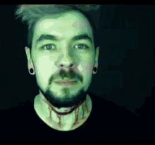 a blurry image of a man with a beard