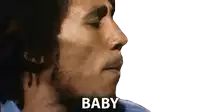 a close up of a man 's face with the word baby written below it