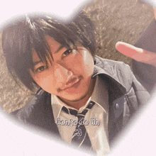 a heart shaped picture of a man with kento de lin written on it