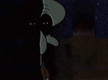 squidward from spongebob is standing in the dark with his eyes closed