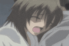 a close up of a girl with her mouth open
