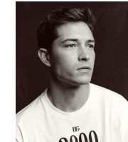 a black and white photo of a man wearing a t-shirt that says ' bg 2000 '
