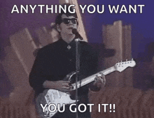Microphone Roy Orbison GIF - Microphone Roy Orbison Guitar GIFs
