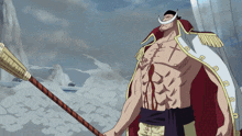 a man with a white beard and a red cape is holding a sword