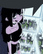 a girl is standing in front of a fridge filled with cans of monster energy drink .