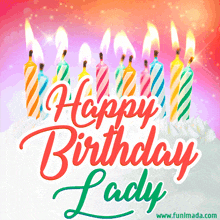 a birthday cake with candles and the words happy birthday lady