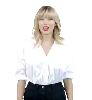 a woman in a white shirt and black pants is making a funny face