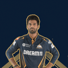 a man wearing a shirt that says dream11