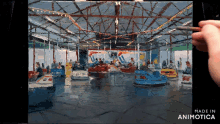 a painting of a merry go round is being made by animatica