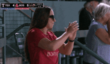 a woman wearing a shirt that says ' i 'm not boring '