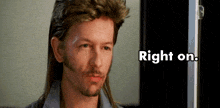 a man with a mullet and a beard is standing in front of a sign that says right on