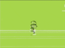 a green cartoon character with big eyes is standing in a circle on a colorful background .