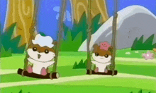 two hamsters are swinging on a wooden swing