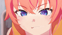 a girl with red hair and blue eyes is making a face