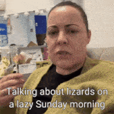 a woman is sitting on a couch and talking about lizards on a lazy sunday morning