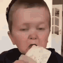 boy eating bread