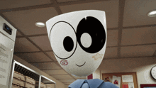 a cartoon character with a smiley face and a star on his chest