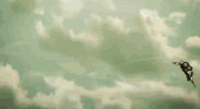 a man is flying through the air holding a sword .