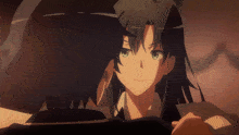 a man and a woman are looking at each other in a dark room