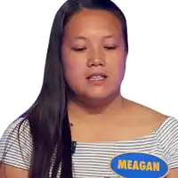 a woman has a name tag that says meagan on it