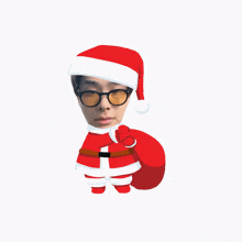 a man wearing a santa hat and holding a gift box