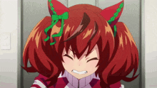 a close up of a girl with red hair and green ears