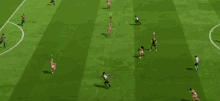 a soccer game is being played on a field that has a sign that says it 's in the game