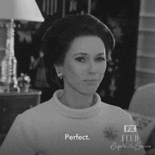 a black and white photo of a woman says perfect