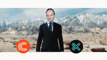 a man in a suit and tie is standing in front of a mountain with a circle with the letter c on it