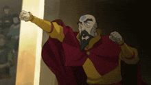 a bald man with a beard wearing a red cape and yellow sleeves