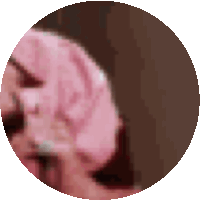 a pixelated image of a person 's face in a circle .