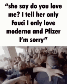 a crowd of people standing in front of a sign that says she say do you love me ? i tell her only fauci