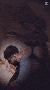 a double exposure of a man and a lion 's head
