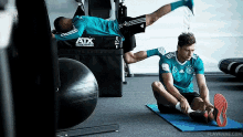 World Cup Russia Exercise GIF - World Cup Russia Exercise Massage Leg GIFs
