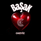 a red heart with the word basak written above it