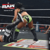 a woman in a wrestling ring with the date september 22 2025 on the top
