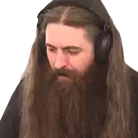a man with a long beard wearing headphones looks down
