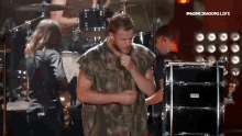 dan reynolds imagine dragons dancing on stage rolly polly