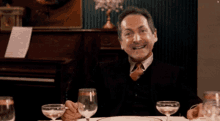 Gérard Houllier Godfather GIF - Gérard Houllier Godfather Tapping Fingers GIFs