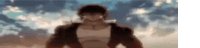a man is standing in front of a cloudy sky in a blurry picture .