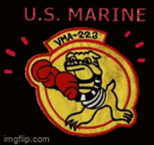 a patch for the u.s. marines shows a bulldog wearing boxing gloves
