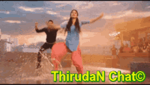 a man and a woman are dancing in the water with the words thirudan chato written on the bottom