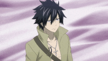 a man with a necklace around his neck has a tattoo on his chest