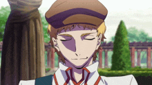 a man with his eyes closed wearing a purple hat and a white shirt
