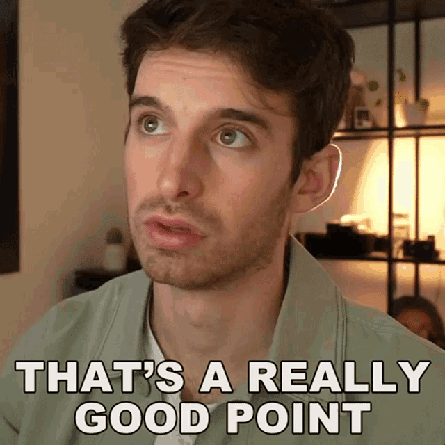 a man says that 's a really good point in front of a shelf